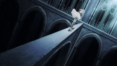 a woman in a white dress is walking down a staircase in a dark room