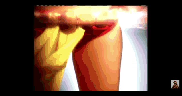 a woman 's legs are shown in a colorful video