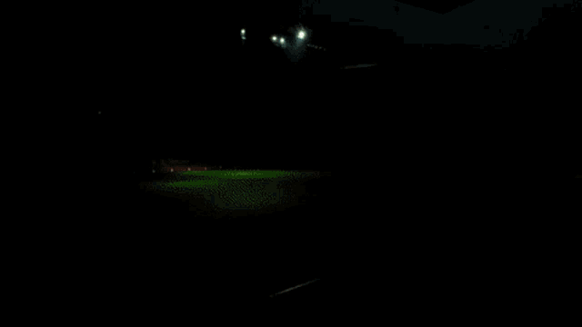 an empty soccer field with galatasaray written on the field