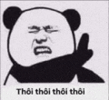 a panda bear is making a funny face while holding a finger up .