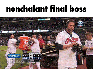 a man in an indians uniform stands on the field