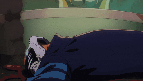 a person with a helmet on laying on the floor