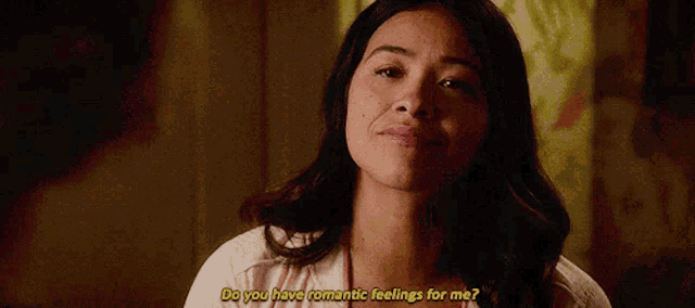a woman is asking if she has romantic feelings for someone