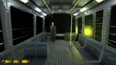 a man in a suit stands in a dark subway car with the number 94 on the bottom