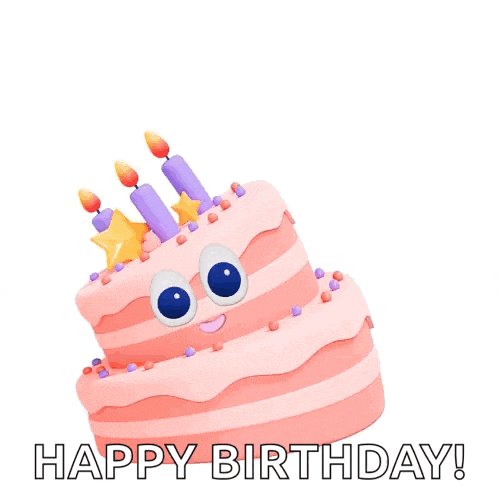 a pink birthday cake with candles and sprinkles and the words happy birthday