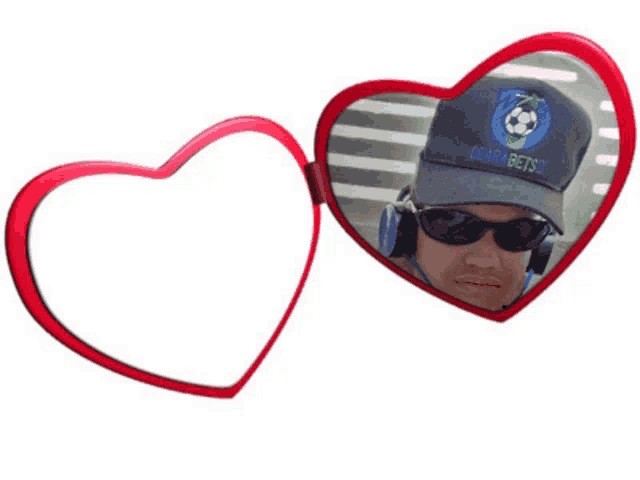 a man wearing headphones and a hat that says clarabets on it