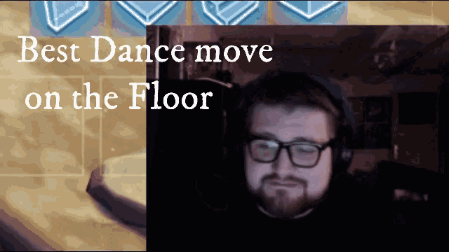 a man with glasses and headphones is playing a video game with the words " best dance move on the floor " above him
