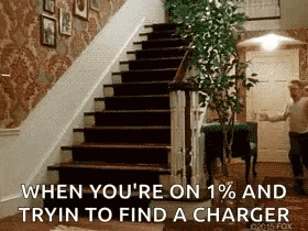 a staircase with a caption that says when you 're on 1% and trying to find a charger