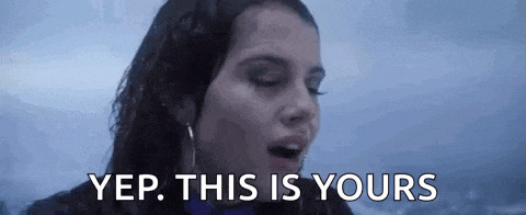 a close up of a woman 's face with the words `` yep , this is yours '' .