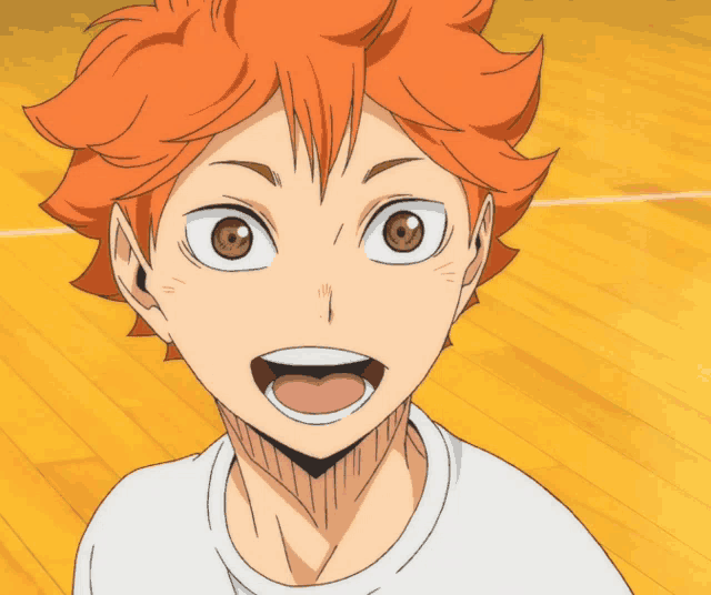 a close up of a person 's face with orange hair