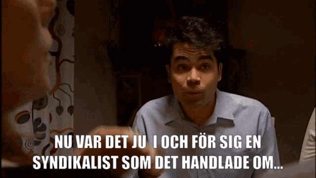 a man talking to another man with the words nu var det ju i och for sig en syndikalist som det handlade om written below him