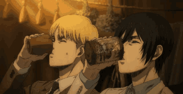 a man and a woman drinking from a can