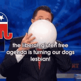 a man blowing up a balloon with the words " the liberal gluten free agenda is turning our dogs lesbian " on the bottom
