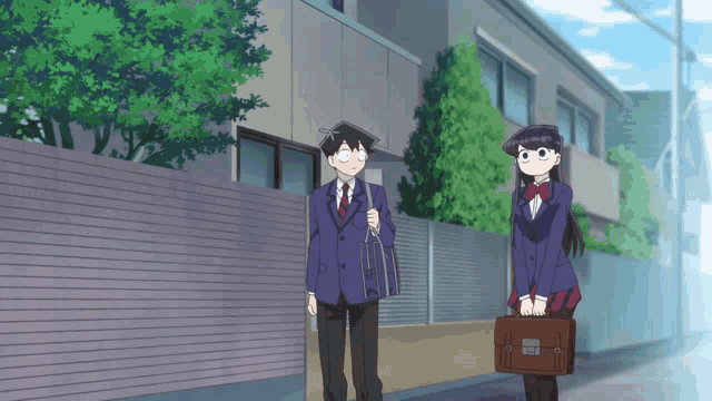a boy and a girl are standing next to each other