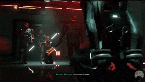 a video game is being played in a dark room with a person laying on a fire blanket .