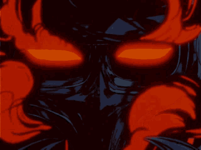 a close up of a person 's legs with a red light behind them