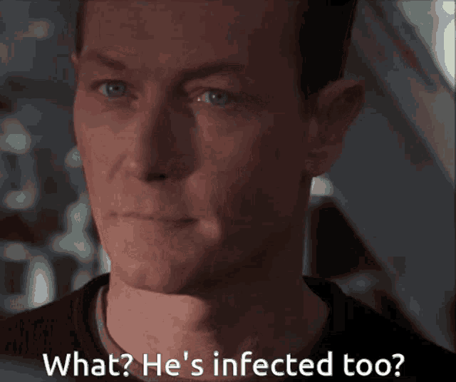 a close up of a man 's face with the words what ? he 's infected too