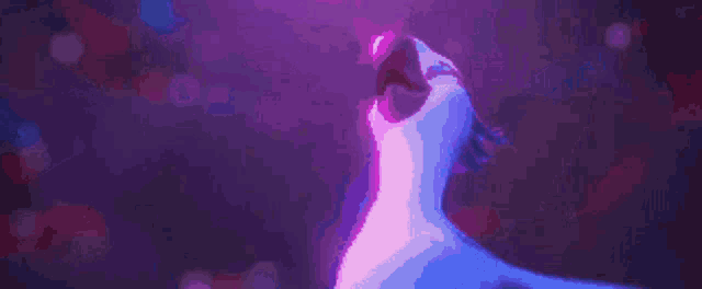 a pixel art of a bird with its wings spread in a dark room .