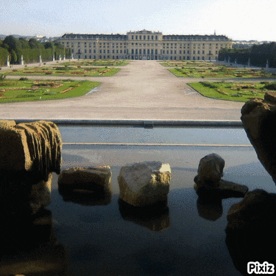a picture of a large building with pixiz written on the bottom right