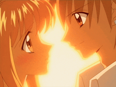 a boy and a girl are looking at each other with the sun shining behind them