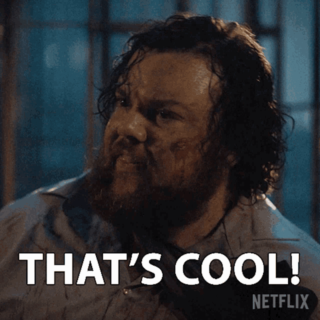 a man with a beard says " that 's cool "