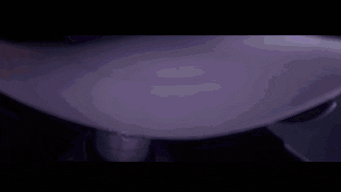 a purple background with a few lines of light