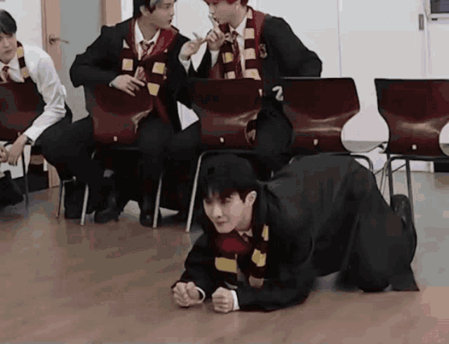 a man in a harry potter costume kneeling down