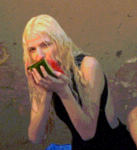 a woman in a black one piece swimsuit is eating a slice of watermelon