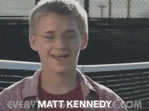 a young man wearing glasses says " every matt kennedy " on the bottom