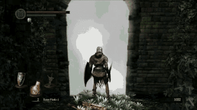 a video game screen shows a knight with a shield standing in front of a brick wall