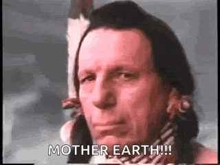a close up of a man 's face with the words `` mother earth '' .