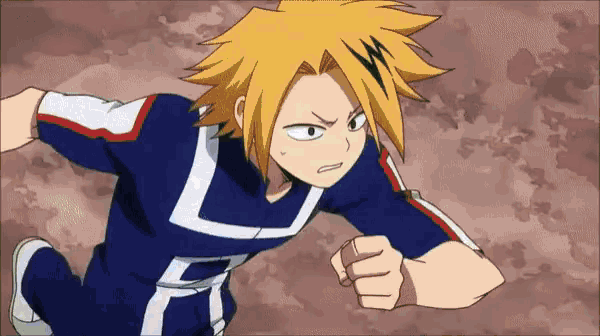 a cartoon character with yellow hair and a blue shirt with a l on it
