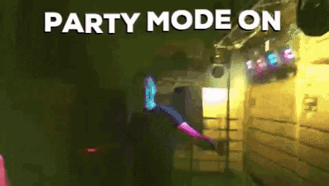 a man is dancing in a dark room and the words party mode on are above him
