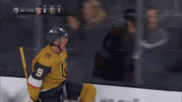 two hockey players wearing jerseys with the number 41 on them