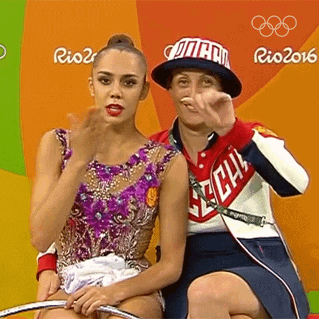 a woman wearing a hat that says ' rio 2016 ' on it