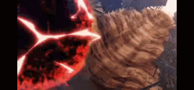 a person is fighting a monster in a video game with a red flame coming out of their mouth .