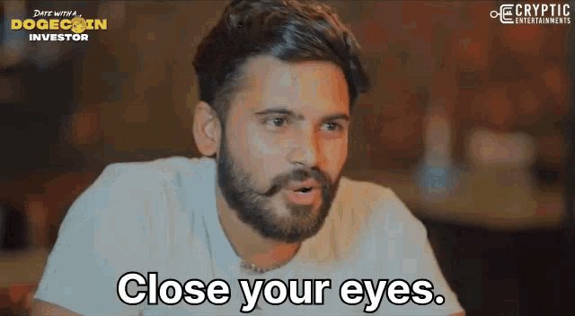 a man with a beard and mustache is saying " close your eyes "