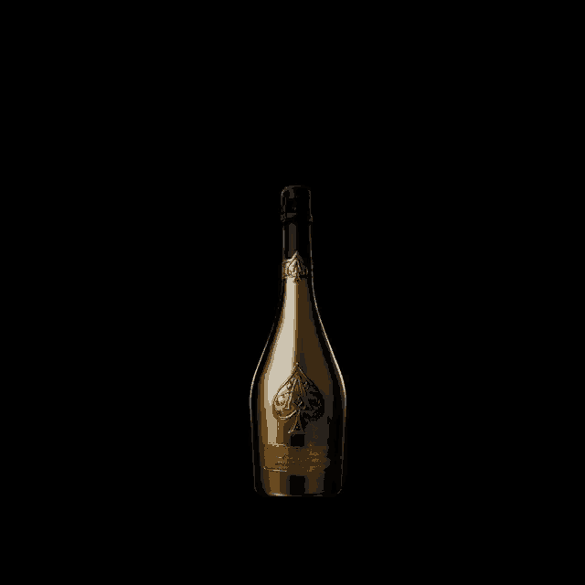 a bottle of armand de brignac champagne has smoke coming out of it