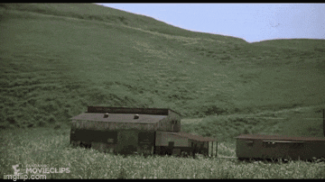 a movie clip from movieclips.com shows a house in a field