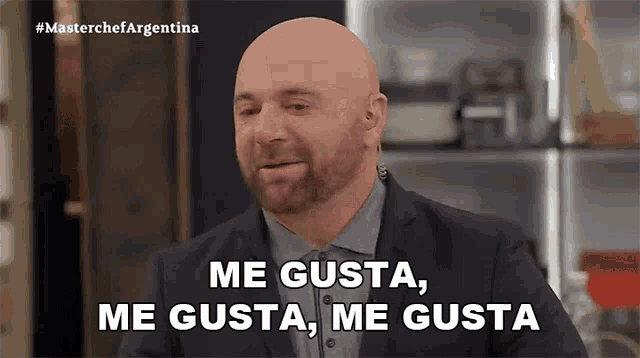 a bald man with a beard is saying me gusta me gusta