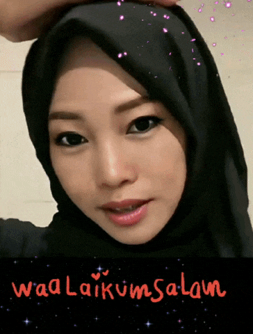 a picture of a woman wearing a black hijab and the words waalaikum salam