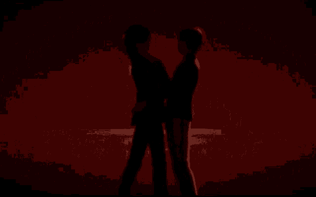 a couple of anime characters are standing next to each other and kissing .