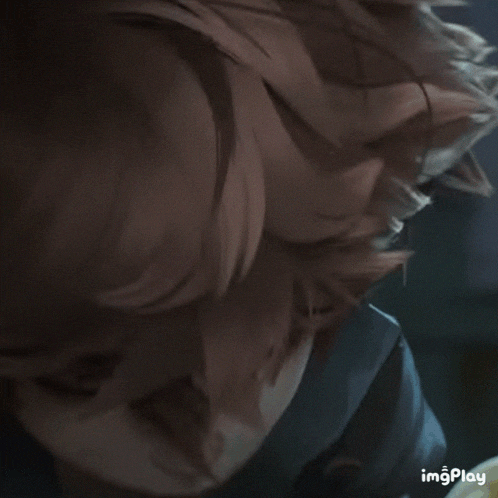 a close up of a person 's face with the word imgplay in the lower right corner