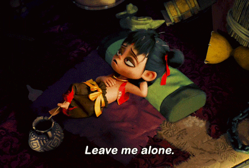 a cartoon character laying on a bed with the words " leave me alone " written on the bottom