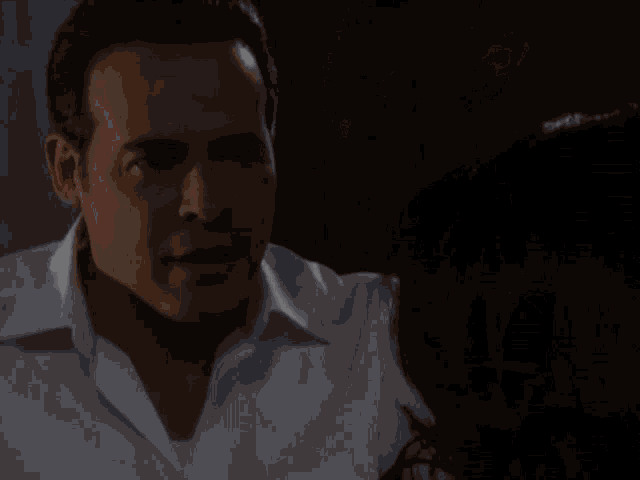a woman is looking over a man 's shoulder .