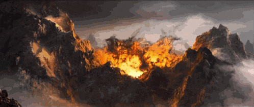 a painting of a mountain covered in fire