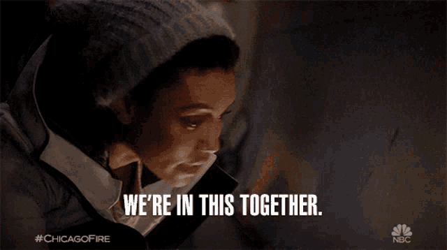 a woman says " we 're in this together " while looking down