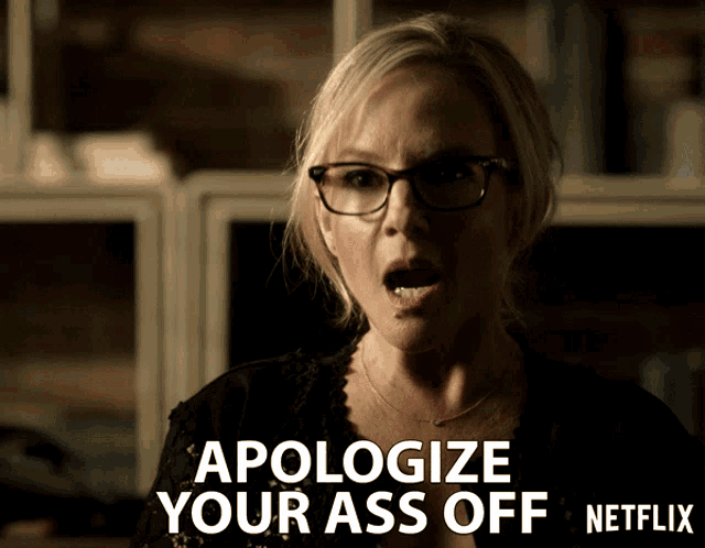 a woman wearing glasses says " apologize your ass off "