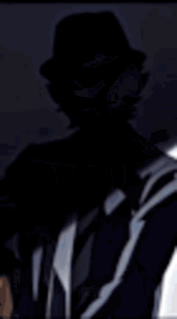 a close up of a person wearing headphones standing next to a car .
