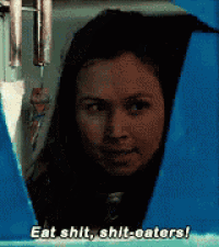 a woman is saying eat shit shit-eaters